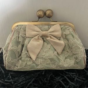 Mint satiny green clutch with snap ball closure